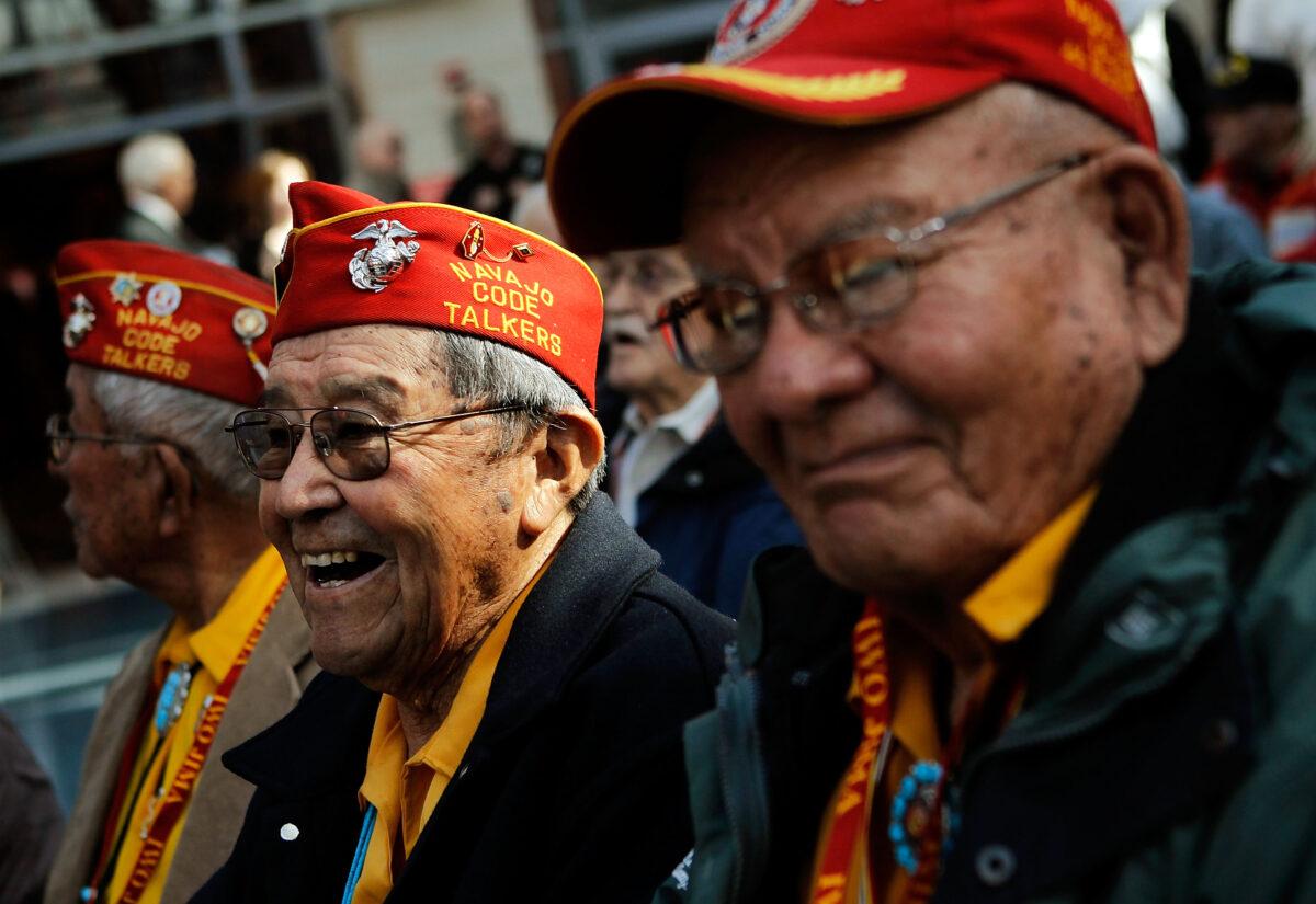 Frank Willetto (2nd R) of Crownpoint, N.M., and Keith Little (R) of Navajo, N.M., both members of the Navajo Code Talkers during World War II, attend a ceremony to mark the 65th anniversary of the battle of Iwo Jima, in Triangle, Va., on Feb. 19, 2010. (Alex Wong/Getty Images)