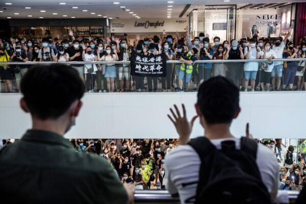 Pro-democracy demonstrators protest calling for the city's independence in Hong Kong on May 10, 2020. (Isaac Lawrence/AFP via Getty Images)