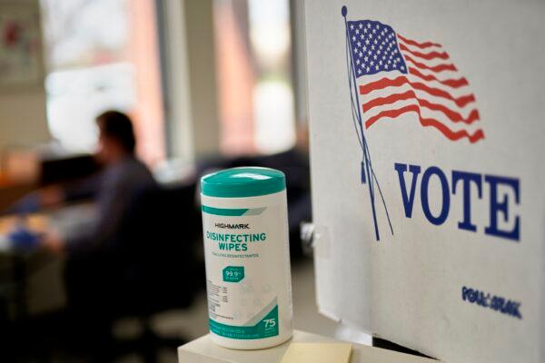 Disinfecting wipes stand at the ready at the Lancaster County Election Committee offices in Lincoln, Neb., on April 14, 2020. (Nati Harnik/AP Photo)