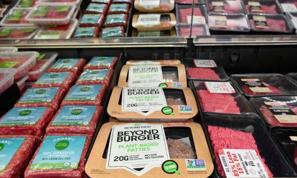 Beyond Meat "Beyond Burger" patties made from plant-based substitutes for meat products sit alongside various packages of ground beef for sale in New York City on Nov. 15, 2019. (Angela Weiss/Getty Images)