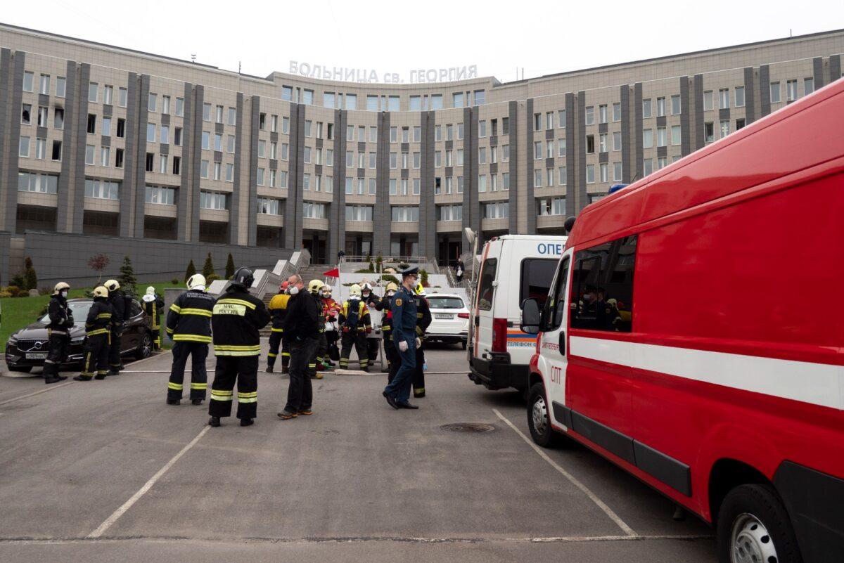 Russian Emergency Situation workers attend the scene of a fire at St. George Hospital in St. Petersburg, Russia, on May 12, 2020. (Dmitry Lovetsky/AP Photo)