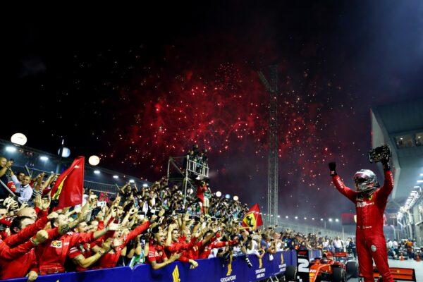 Race winner Sebastian Vettel of Germany and Ferrari celebrates in parc ferme during the F1 Grand Prix of Singapore at Marina Bay Street Circuit in Singapore, on Sept. 22, 2019. (Lars Baron/Getty Images)