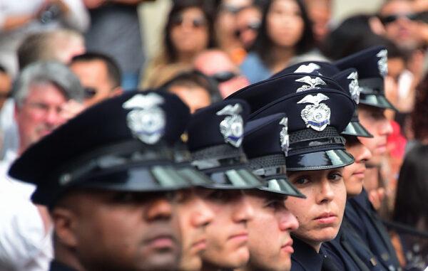 Police recruits attend their graduation ceremony at LAPD Headquarters on July 8, 2016, in Los Angeles. (Frederic J. Brown/AFP via Getty Images)