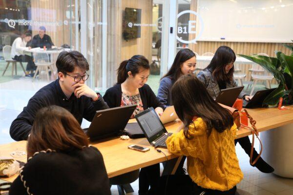 People work at start-up incubator Soho3Q in Beijing, China, on Jan. 9, 2018. (Ludovic Marin/AFP/Getty Images)