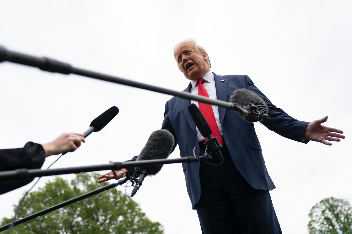 President Donald Trump speaks to reporters on his way to Marine One on the South Lawn of the White House in Washington, on May 14, 2020 (Drew Angerer/Getty Images)