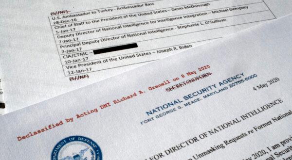 A declassified document with names of Obama administration officials who made requests for unmasking of Michael Flynn’s name is photographed on May 13, 2020. (AP Photo/Jon Elswick)