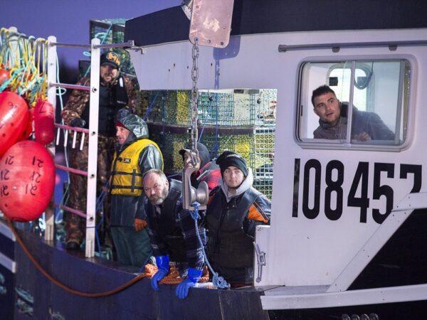 Fishing boats head from port in West Dover, N.S., on Nov. 26, 2019 as the lobster season on Nova Scotia's South Shore begins. (Andrew Vaughan/The Canadian Press)