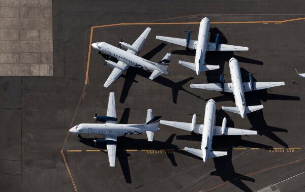  An aerial view of Rex Airlines aircraft at Sydney Airport on April 22, 2020 in Sydney, Australia. (Ryan Pierse/Getty Images)