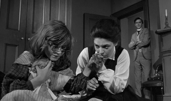 Helen Keller (Patty Duke, L) is frustrated and unable to understand what her teacher (Anne Bancroft) is trying to communicate to her. Her brother James (Andrew Prine) watches. (United Artists)