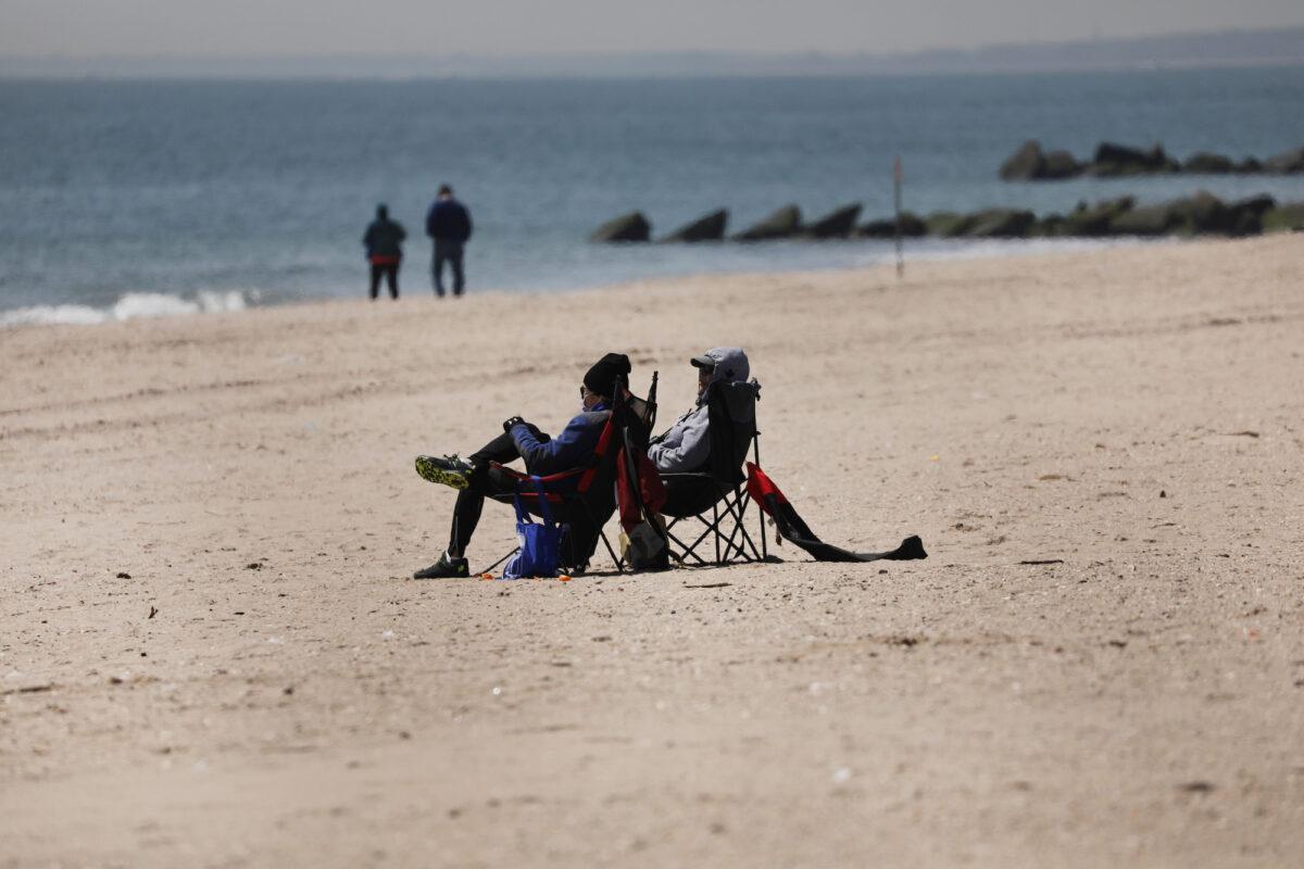 People on the beach at Coney Island, New York City on April 25, 2020. (Spencer Platt/Getty Images)
