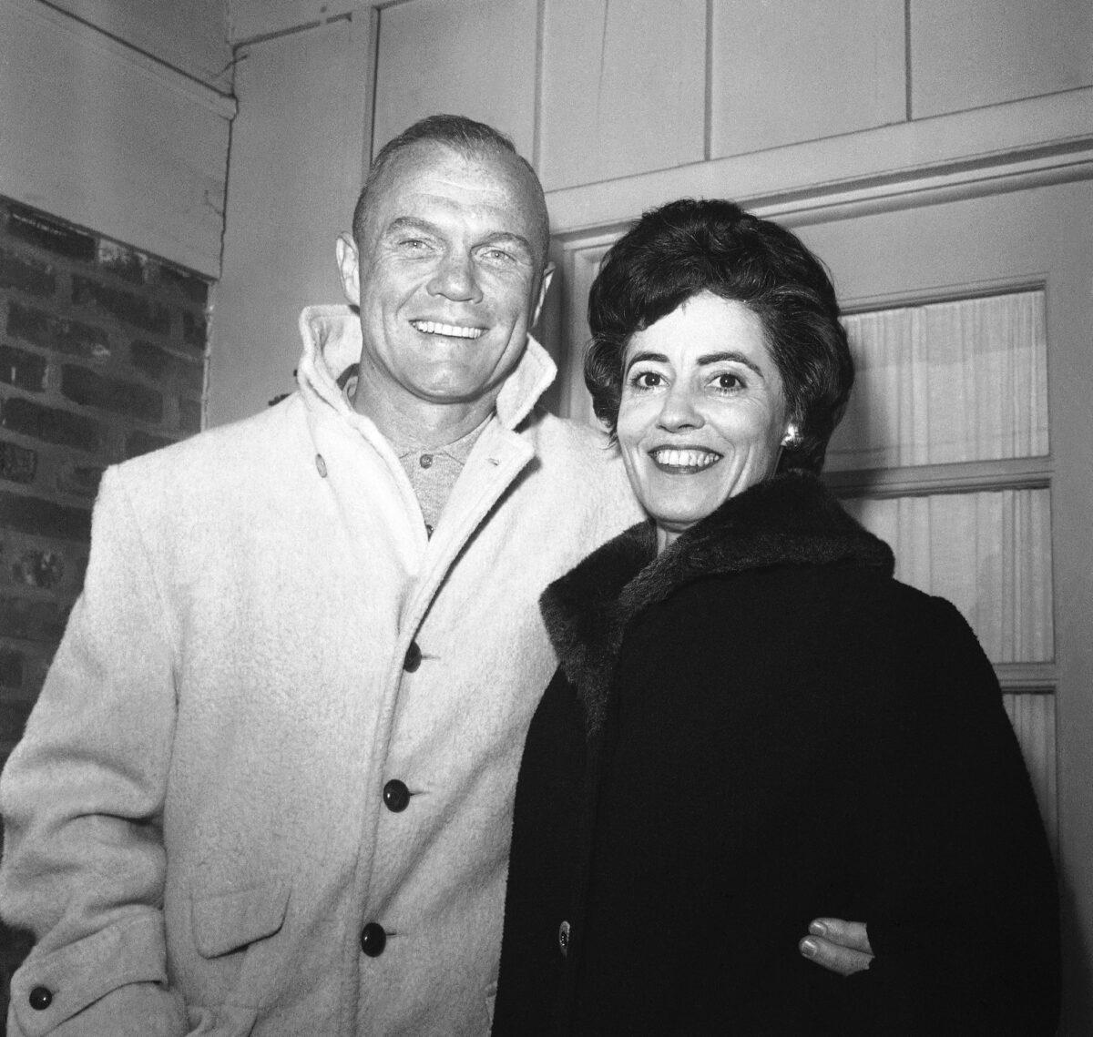 Astronaut John Glenn poses with his wife, Annie, outside their Arlington, Va., home during his first news conference on Feb. 3, 1962. (Bob Schutz/AP Photo/File)