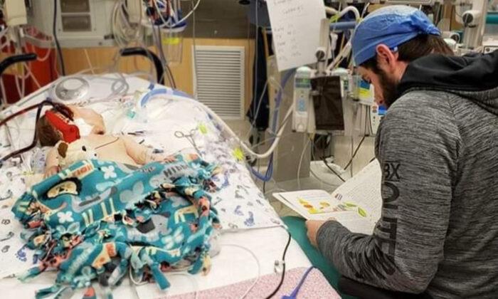 Mom Spots Hospital Worker Reading Storybook to Critically Ill Daughter and Snaps Photo That Goes Viral