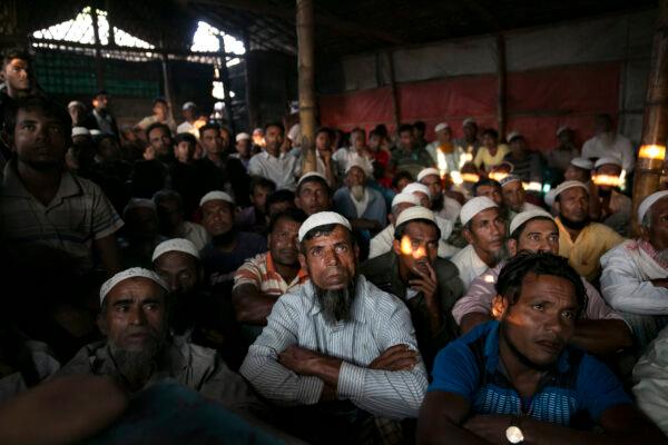 Rohingya refugees watch ICJ proceedings at a restaurant in a refugee camp in Cox's Bazar, Bangladesh, on Dec. 12, 2019. (Allison Joyce/Getty Images)