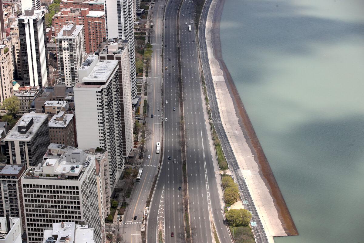 A view from the 360 Chicago observation deck shows a nearly-empty Lake Shore Drive and a deserted lakefront in Chicago, Ill. on May 12, 2020. (Scott Olson/Getty Images)