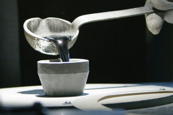 Molten pewter being poured into a cast. (Danforth Pewter)