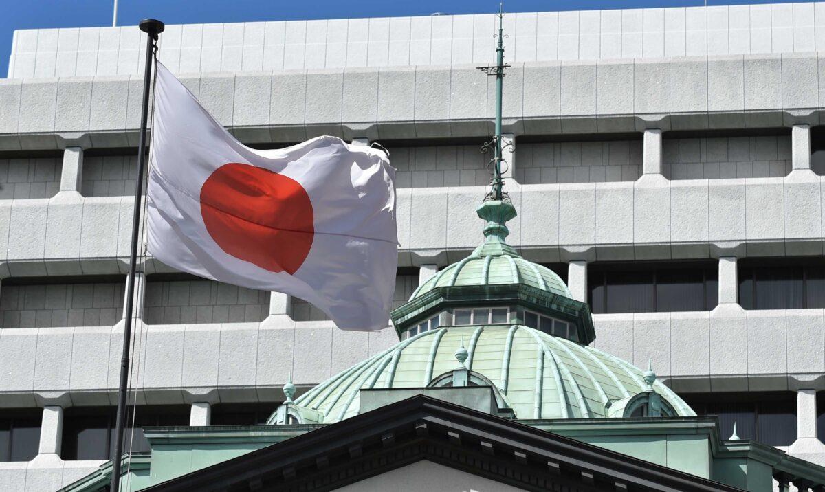 The Japanese national flag is seen at the Bank of Japan headquarters in Tokyo. (Kazuhiro Nogi/AFP via Getty Images)