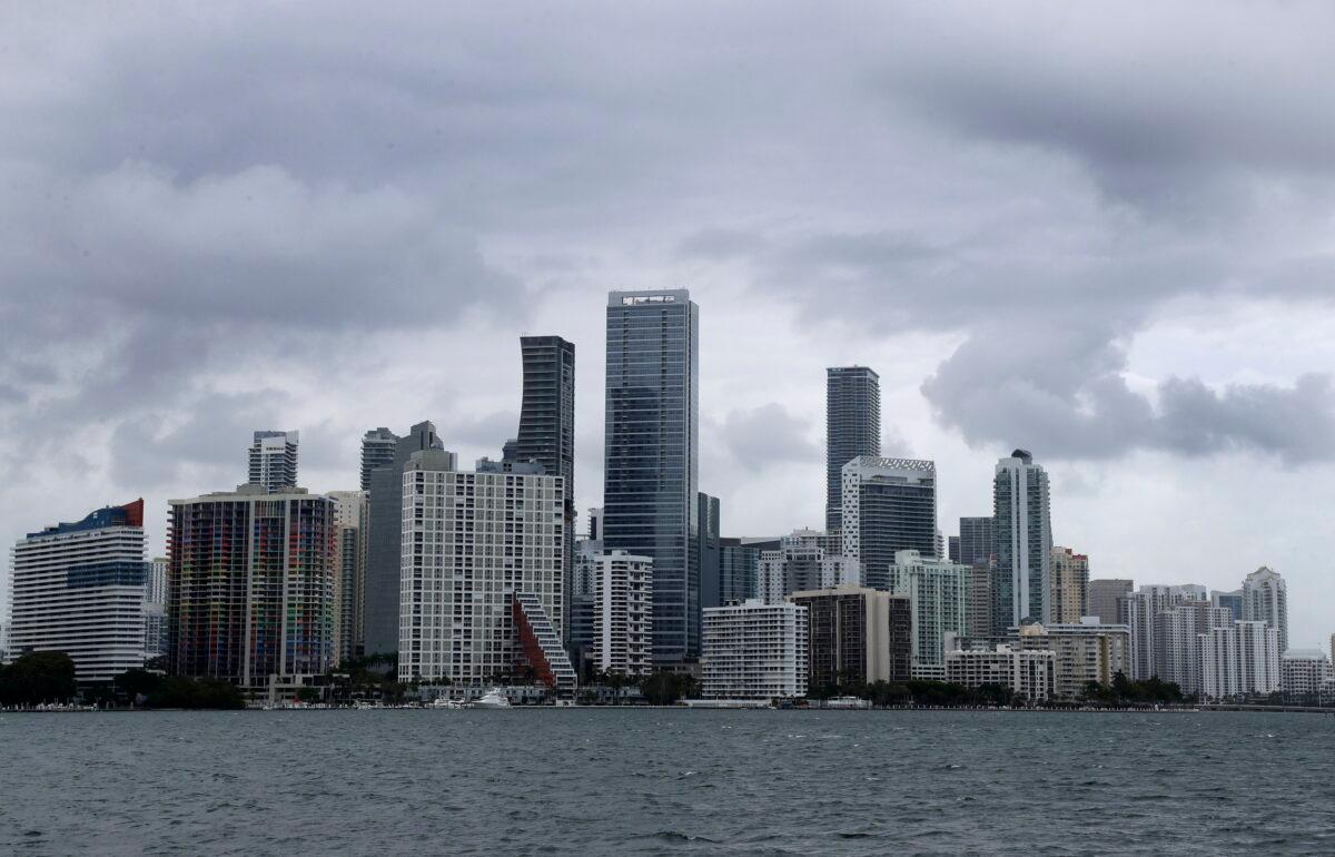 Clouds loom over the Miami skyline on May 14, 2020. (Wilfredo Lee/AP Photo)