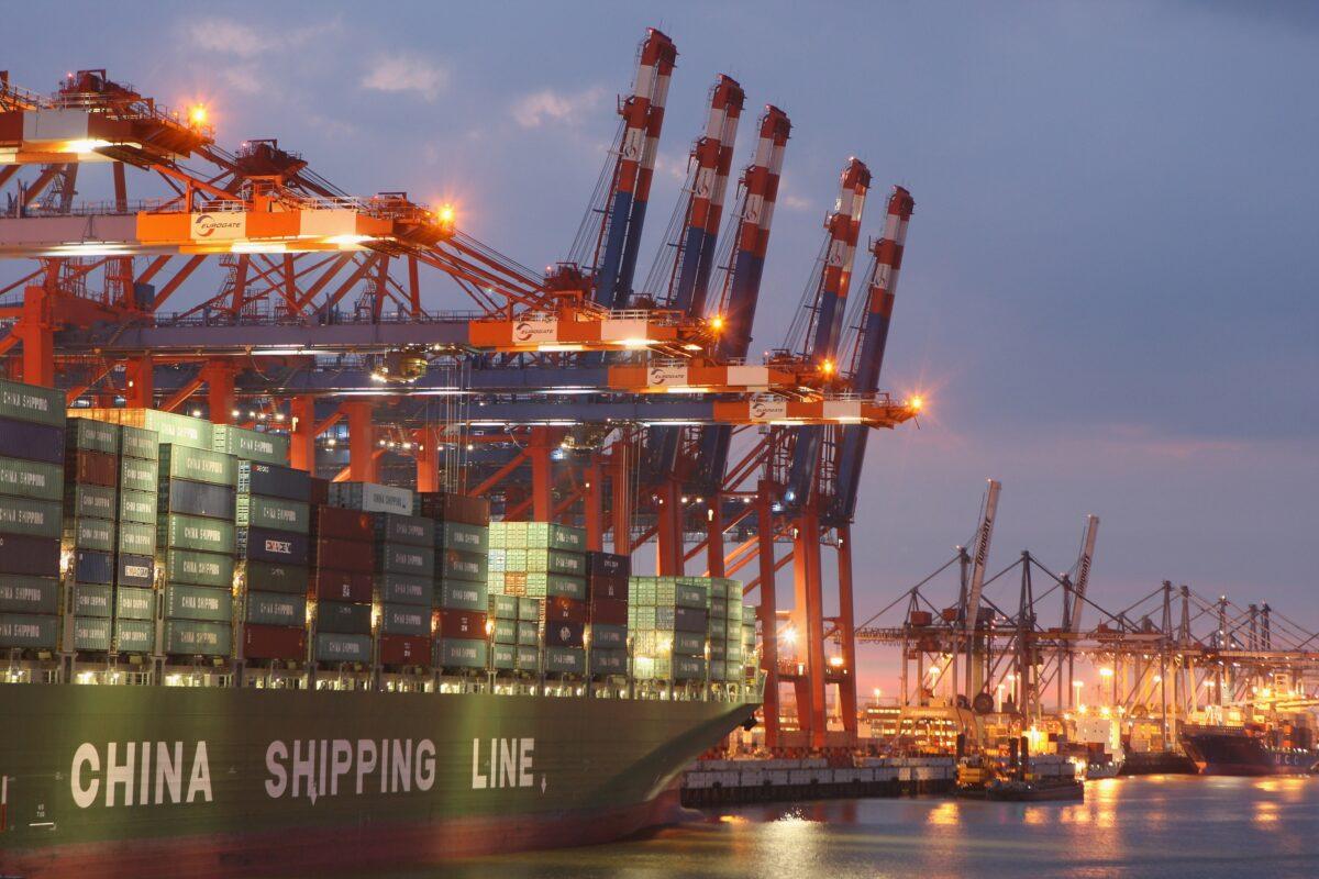  A container ship from China Shipping Line is loaded at the main container port in Hamburg, Germany, on Aug. 13, 2007. Northern Germany, with its busy ports of Hamburg, Bremerhaven, and Kiel, is a hub of international shipping. Hamburg is among Europe's largest ports. (Sean Gallup/Getty Images)
