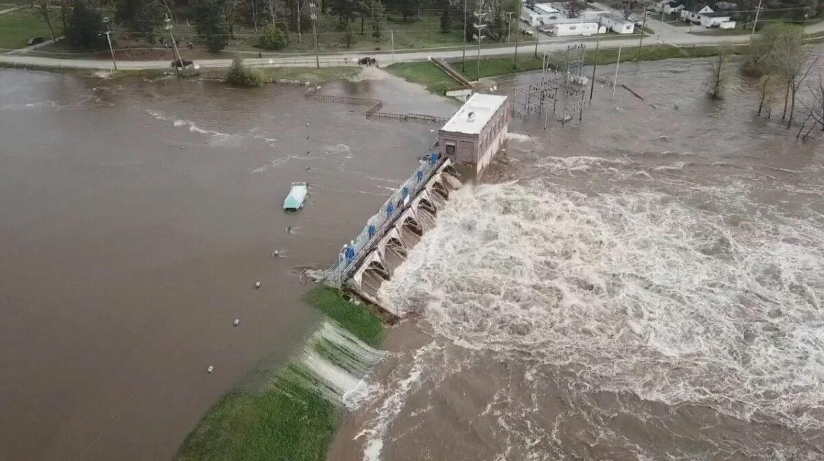 An aerial view of flooding as water overruns Sanford Dam, Mich., on May 19, 2020, still frame obtained from social media video. (TC Vortex /via Reuters)