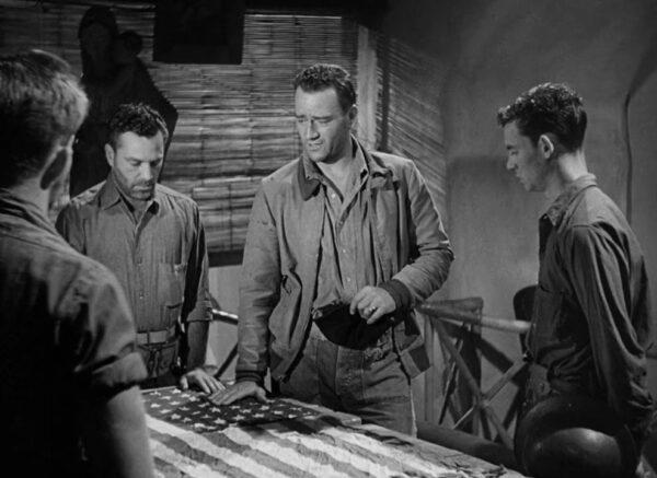John Wayne (2nd R) as Lt. "Rusty" Ryan in “They Were Expendable” from 1945. (MGM)