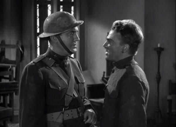 Pat O'Brien (L) and James Cagney star as priest and soldier, respectively, in “The Fighting 69th.” (Warner Bros)