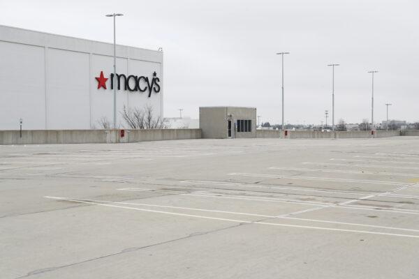 Macy's department store is shown with an empty parking lot at the Roosevelt Field Mall in East Garden City, N.Y., March 20, 2020. (Al Bello/Getty Images)