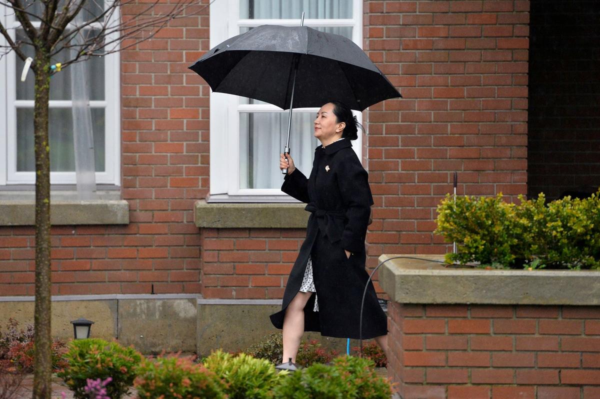 Huawei Chief Financial Officer Meng Wanzhou leaves her home to attend her extradition hearing at B.C. Supreme Court in Vancouver, British Columbia, Canada, on Jan. 23, 2020. (Jennifer Gauthier/Reuters)