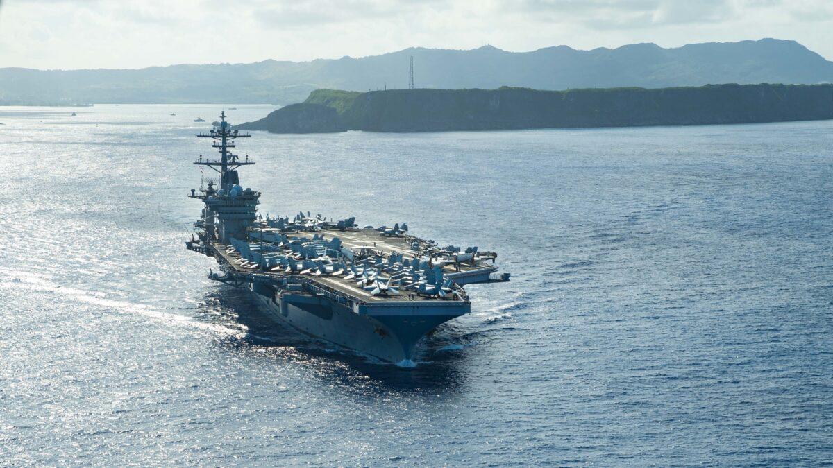 The aircraft carrier USS Theodore Roosevelt (CVN 71) operates in the Philippine Sea May 21, 2020, following an extended visit to Guam in the midst of the COVID-19 global pandemic. (U.S. Navy photo by Mass Communication Specialist Seaman Kaylianna Genier)
