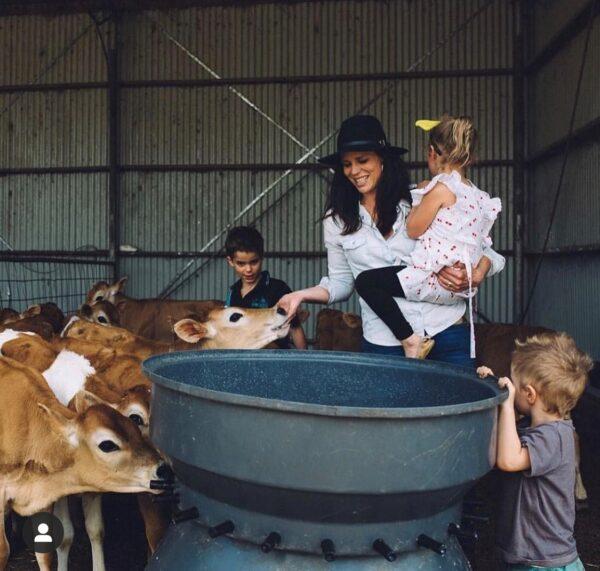 Sallie Jones , one of the owners of Gippsland Jersey with kids and calves. Gippsland Jersey, a participant in Gippsland Connect Programme, is a shining example of Gippsland producers who have created amazing products that put the region on the map. (Supplied)
