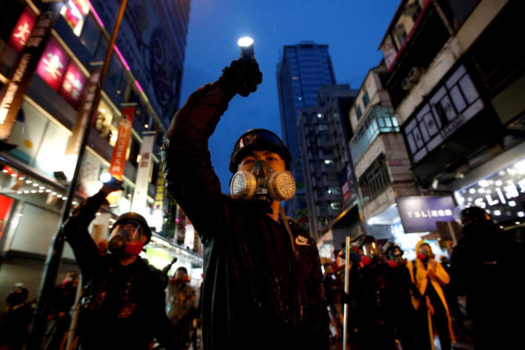 China Plans National Security Laws for Hong Kong After Last Year’s Unrest: Sources
