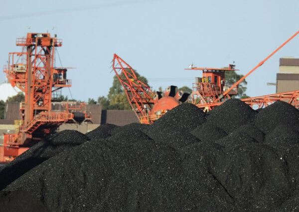 Large coal stocks await loading for export at Port Waratah Coal Services in Newcastle, Australia, on April 12, 2007. (Corey Davis/Getty Images)