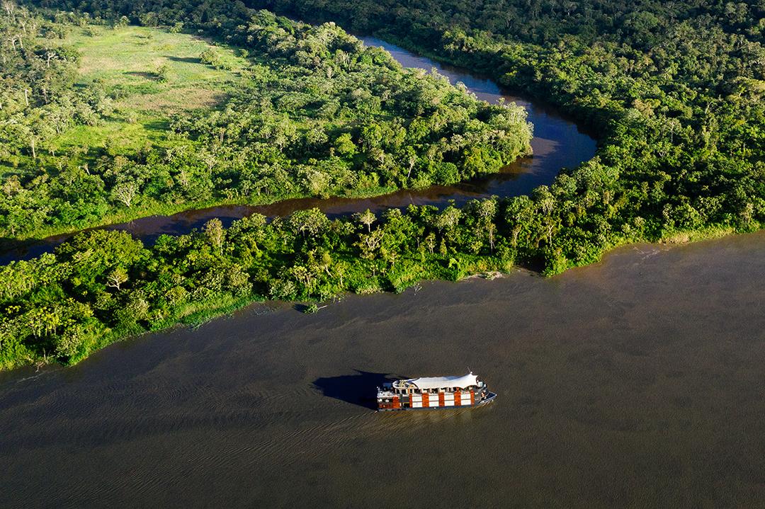 The Amazon river, like a highway cutting the through dense jungle, connects villages and towns. (Courtesy of Aqua Expeditions)