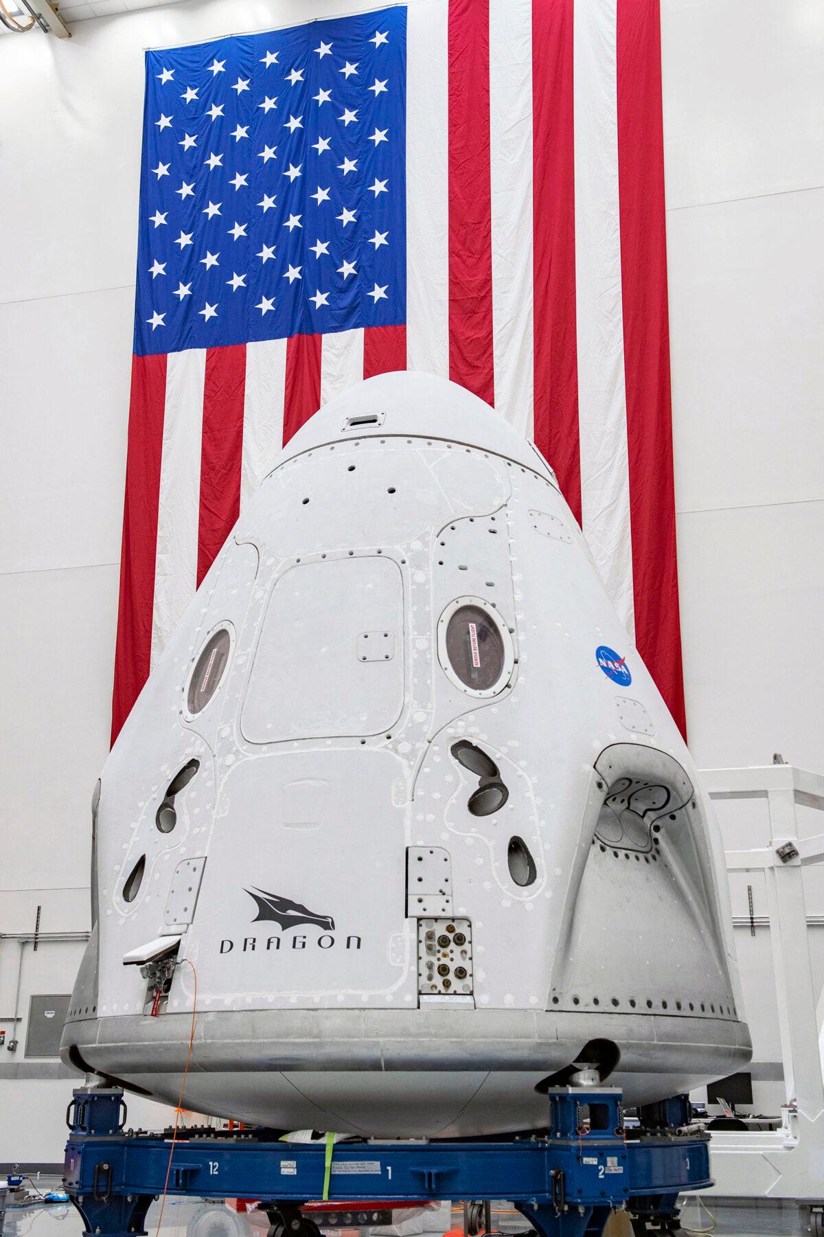 The SpaceX Crew Dragon spacecraft undergoes final processing at Cape Canaveral Air Force Station, Fla., on April 10, 2020. (SpaceX via AP)