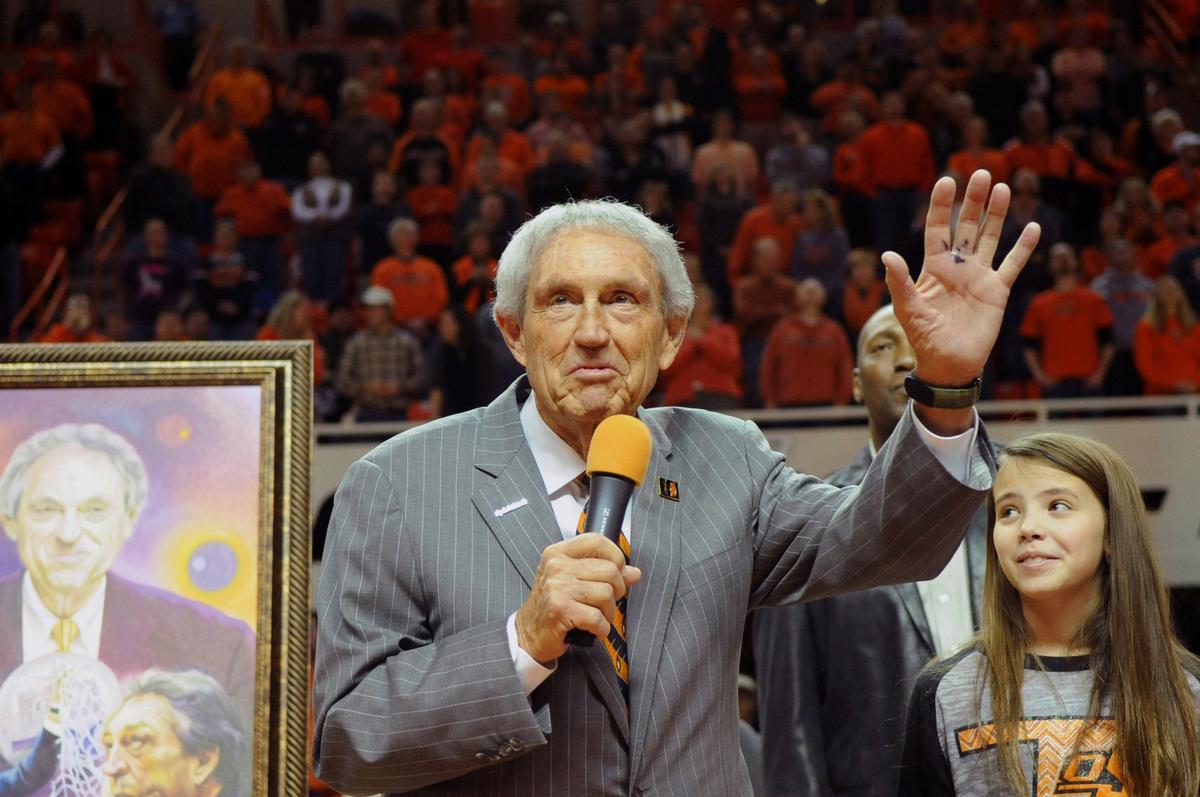 Eddie Sutton, head coach at Oklahoma State between 1990-2006, is honored at halftime of the Oklahoma State basketball game against Iowa State in Stillwater, Okla. Sutton, the Hall of Fame basketball coach on Feb. 3, 2014. (Brody Schmidt/AP file photo)