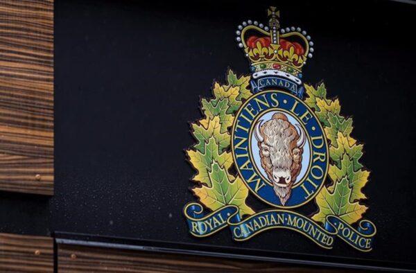 The RCMP logo is seen outside an RCMP building in Surrey, B.C., in a file photo. (Darryl Dyck/The Canadian Press)
