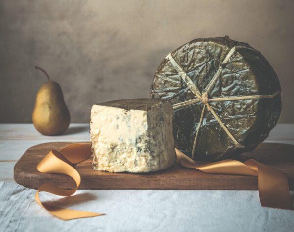 World Champion Rogue River Blue cheese. Each wheel is cave-aged for a minimum of nine months, then wrapped in organic syrah grape leaves that have been hand-picked and macerated in pear spirits made with organic fruit from pear orchards in the Rogue Valley. (Beryl Striewski)
