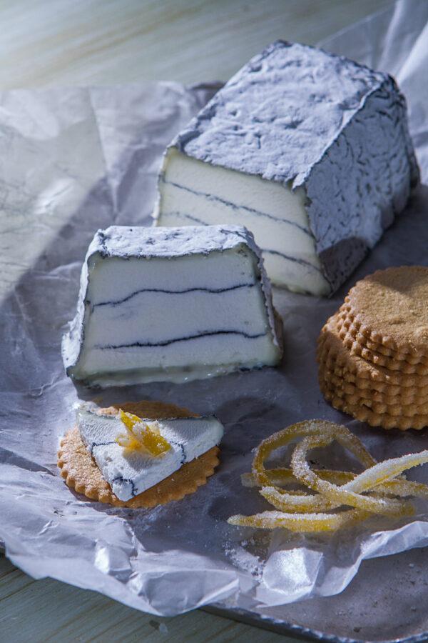 Sofia, Capriole’s most popular ripened goat cheese. Beautifully layered with vegetable ash, Sofia develops a dense, velvety texture as it ripens. (Courtesy of Capriole Goat Cheese)