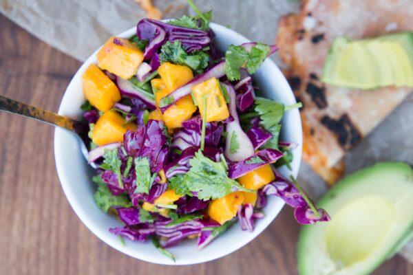 Make the mango and cabbage slaw first, so that it can marinate and get tender and flavorful while you prep the tacos. (Photo by Caroline Chambers)