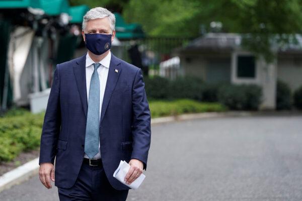 National Security Advisor Robert O'Brien walks after being interviewed at the White House in Washington on May 24, 2020. (Joshua Roberts/Reuters)