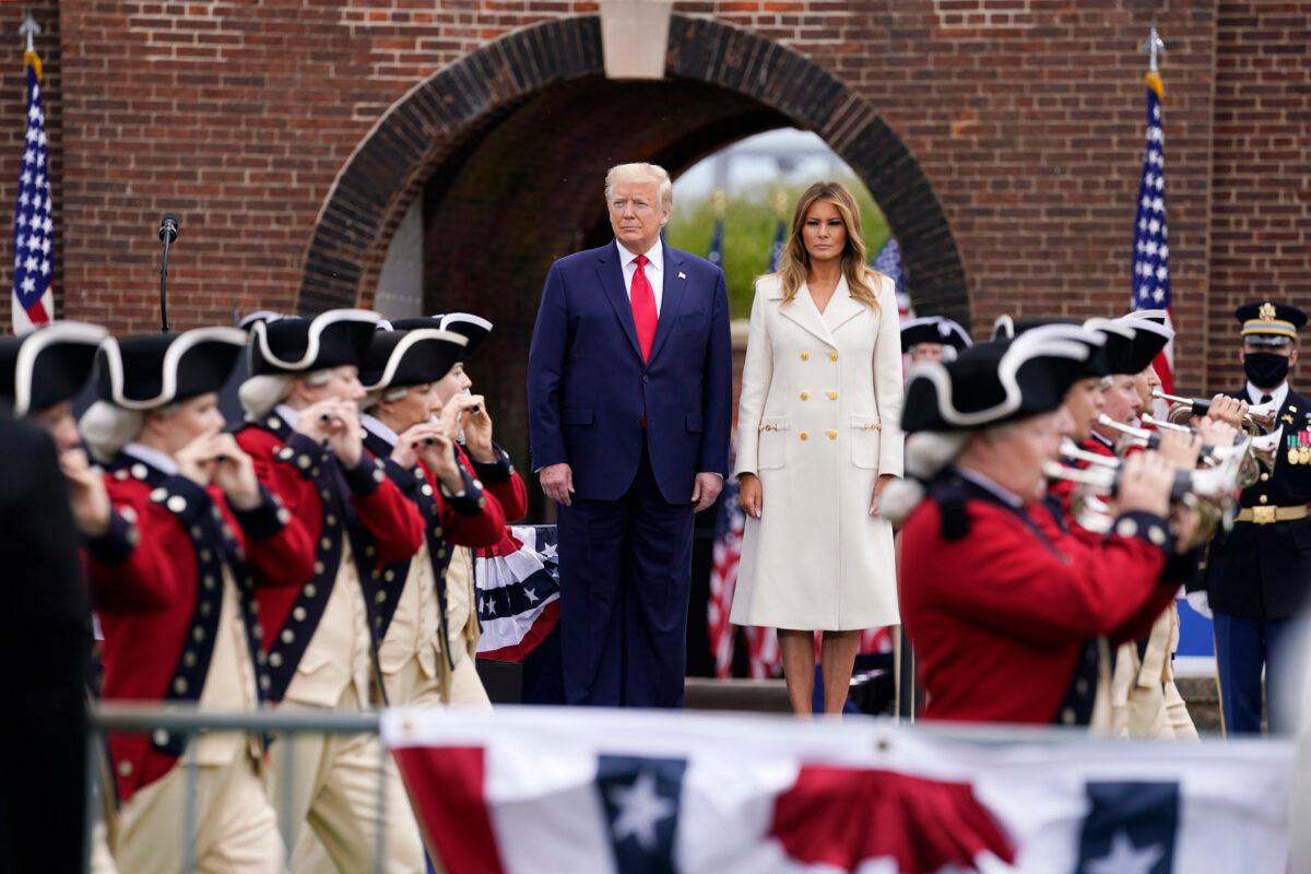 President Donald Trump and First Lady Melania Trump participate in a Memorial Day ceremony at Fort McHenry National Monument and Historic Shrine, in Baltimore, on May 25, 2020. (Evan Vucci/AP Photo)