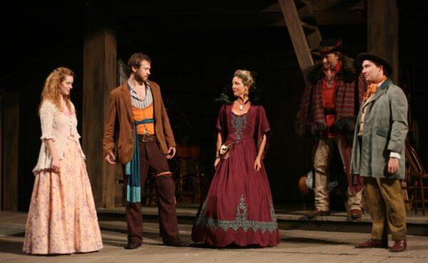(L–R) Princess Imogen (Kate McDermott) and the man she wants to marry, Posthumus (Matthew Keffer); her cruel stepmother (Lia Mortensen); her father, King Cymbeline (John Milewski); and Cloten, her stepbrother (Andrew Behling). (D. Rice)