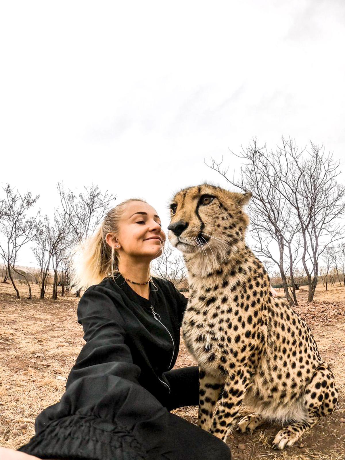 Kristen Kerr hanging out with a cheetah. (Caters News)