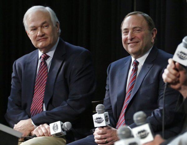 NHL Player's Association executive director Donald Fehr, left, and NHL Commissioner Gary Bettman are shown during a news conference at Nationwide Arena in Columbus, Ohio on Jan. 24, 2015. (Gene J. Puskar/AP Photo)