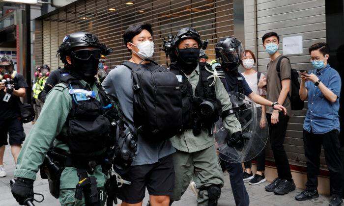 Hong Kong Police Arrest 300 as Thousands Protest