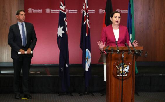Queensland Premier Annastacia Palaszczuk (R) attends a press conference at Parliament House as Treasurer Cameron Dick looks on, on March 25, 2020 in Brisbane, Australia. (Jono Searle/Getty Images)