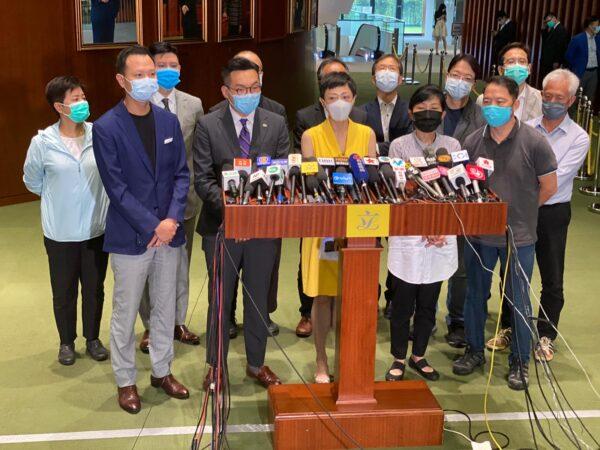 Hong Kong pro-democracy lawmakers hold a press conference in Hong Kong on May, 28, 2020. (L-R) Dennis Kwok, Alvin Yeung, Tanya Chan, Claudia Mo, and Wu Chi-wai are in the front row. (Xiao Long/The Epoch Times)