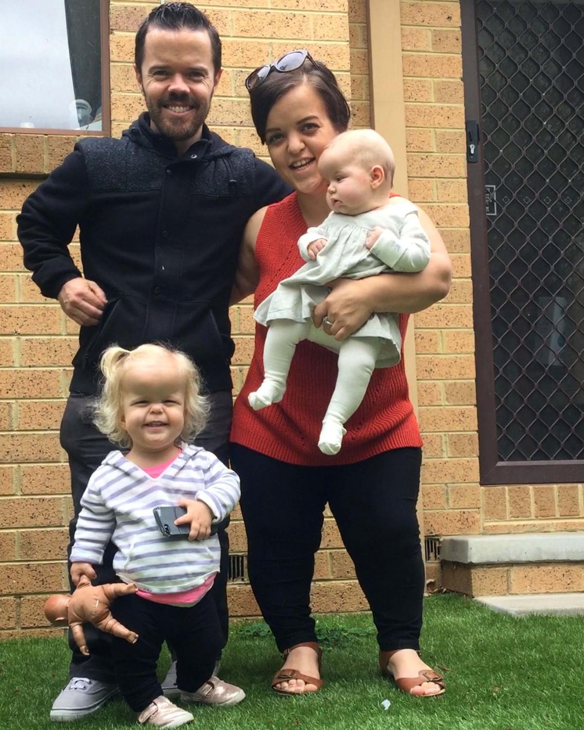 Alyssa Biddle and Jonathon Tripp with their two daughters, Bonnie and Sienna (Caters News)