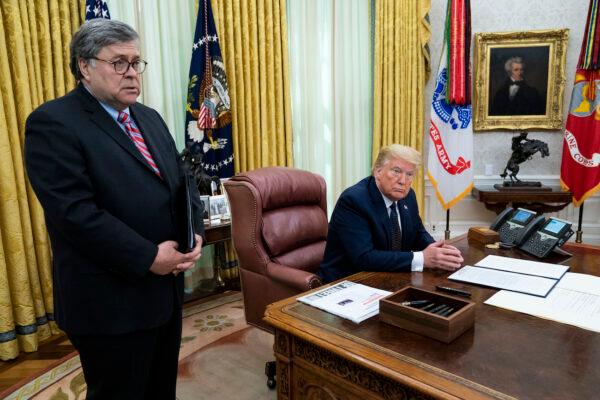 President Donald Trump with Attorney General William Barr, make remarks before signing an executive order in the Oval Office that will punish Facebook, Google and Twitter for the way they police content online, on May 28, 2020. (Doug Mills/The New York Times/Getty Images)