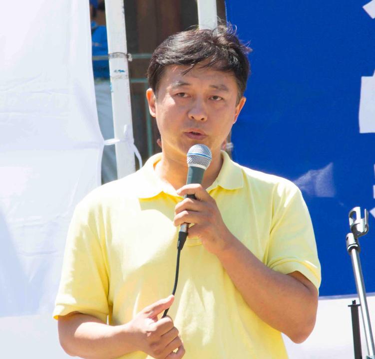 Bu Dongwei speaking at a rally in downtown San Francisco, Calif., on July 16, 2016. (<a href="https://en.minghui.org/">Minghui</a>)