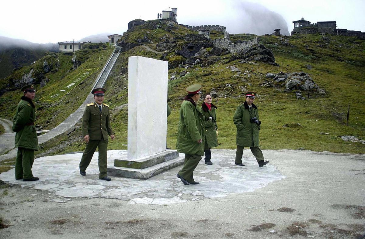 Chinese soldiers are seen at the Nathula Pass area at the India-China border in the northeastern Indian state of Sikkim. (STR/AFP/Getty Images)